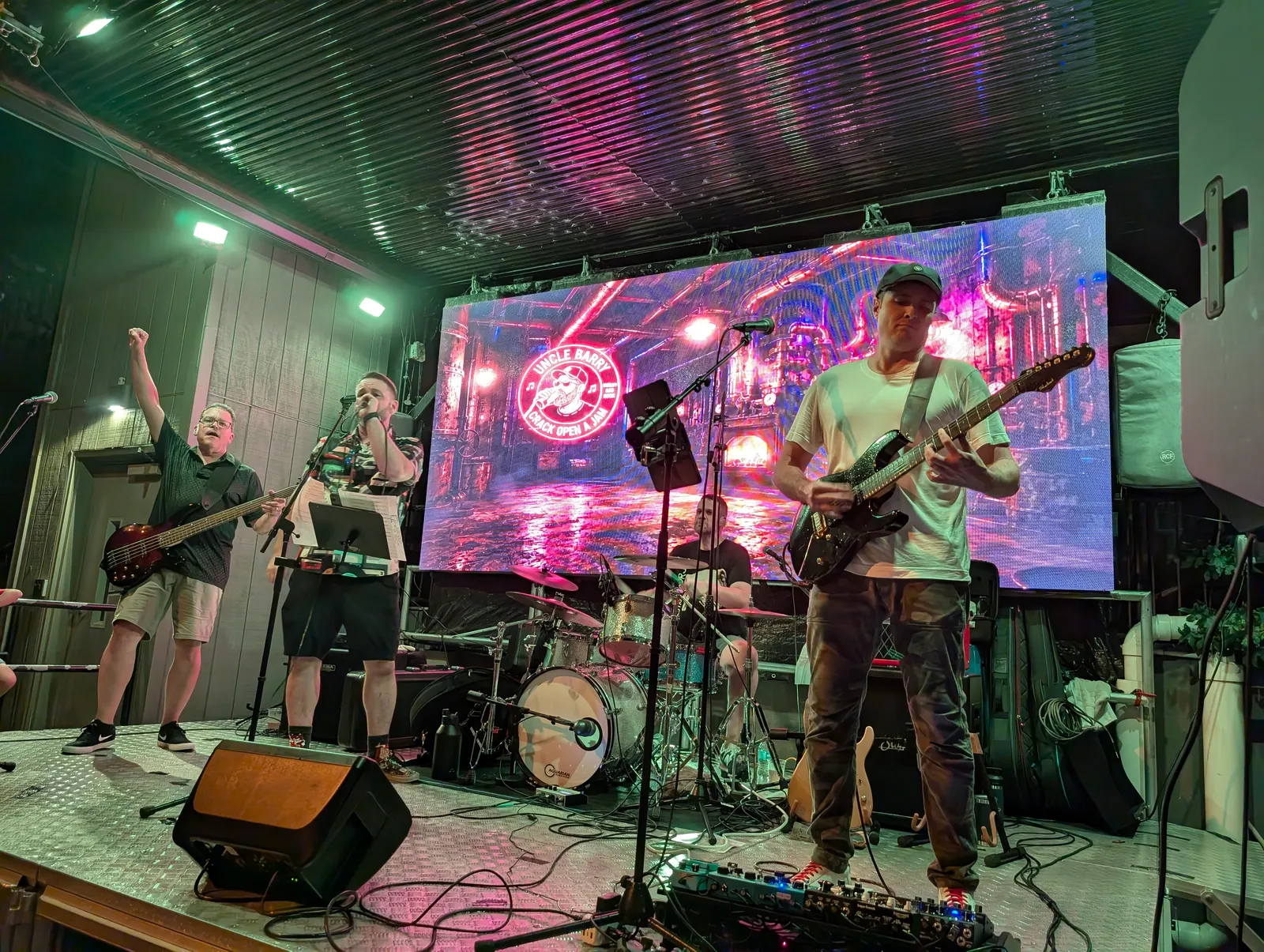Full band on stage at Gate City Brewing