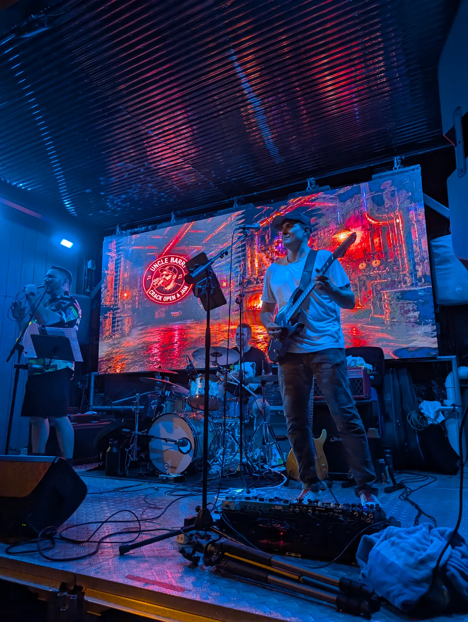 Nick on guitar with Greg and Josh at Gate City Brewing